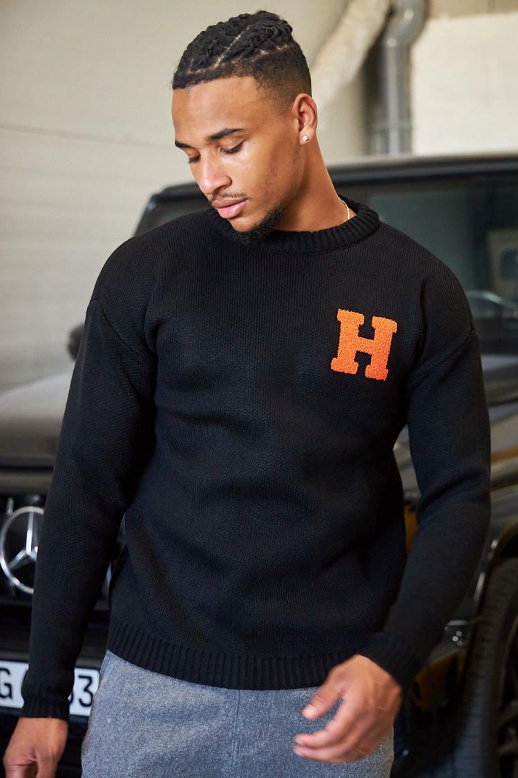 Pull noir en maille à logo 