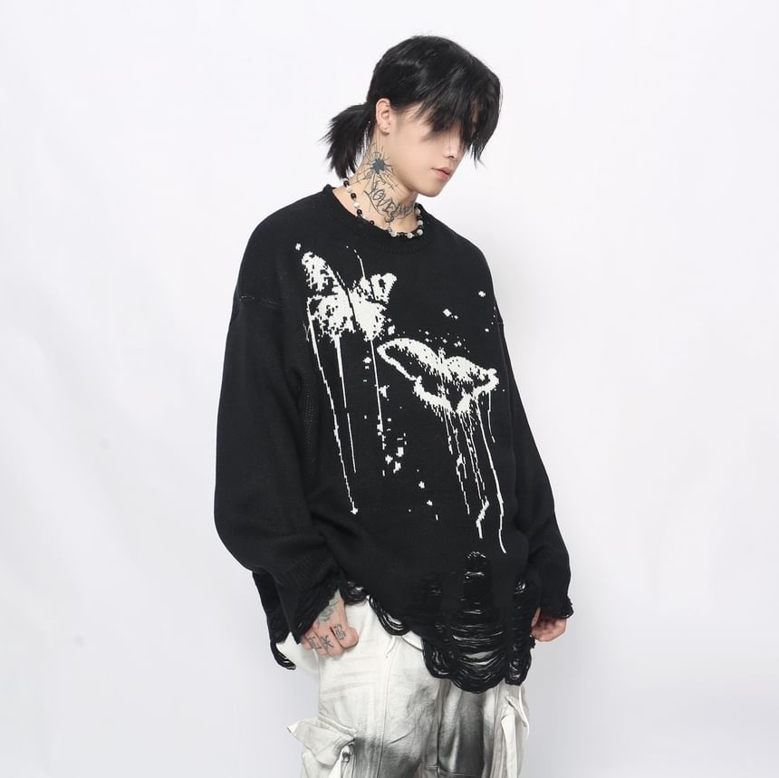 Derbundy - Oversized trui met ronde hals en vlinderprint