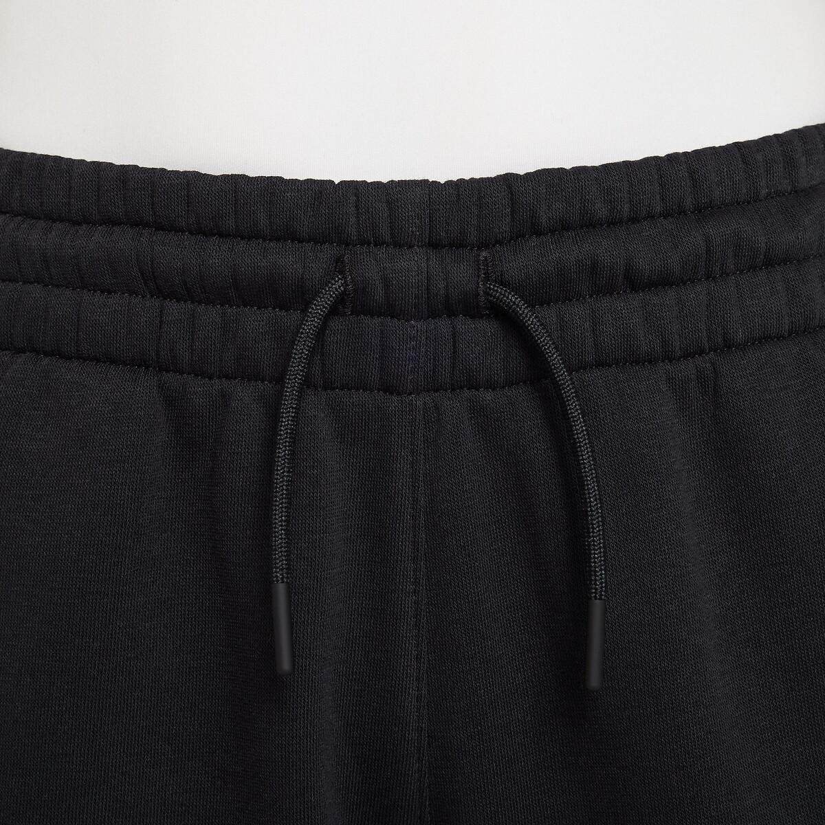 NIKE<br>Calças de moletom achatadas