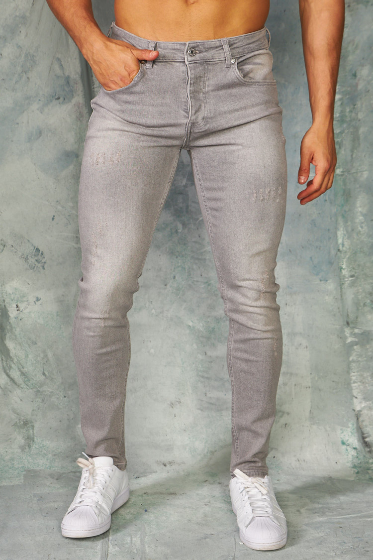 Jeans slim gris griffé