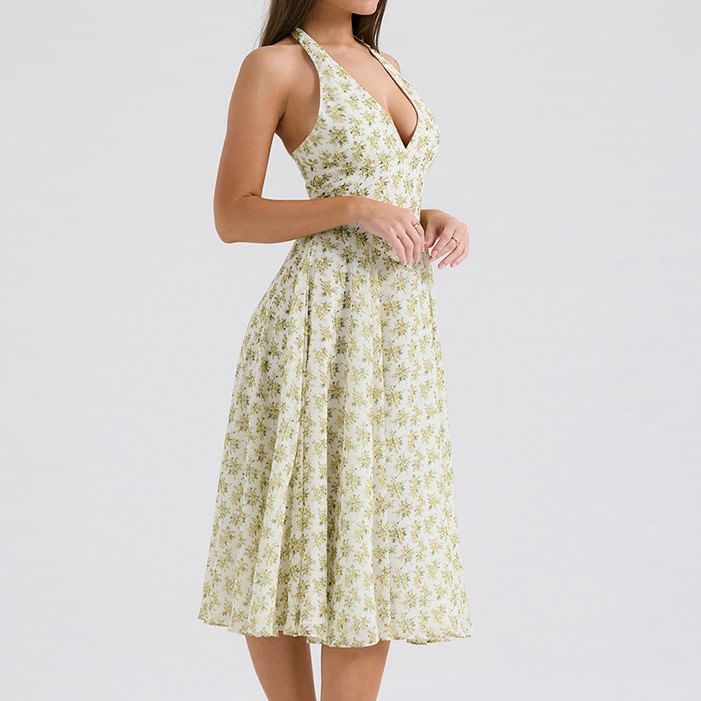 Puffields - Halter V-hals Diepuitgesneden Bloemenprint Open Rug Midi A-lijn Jurk