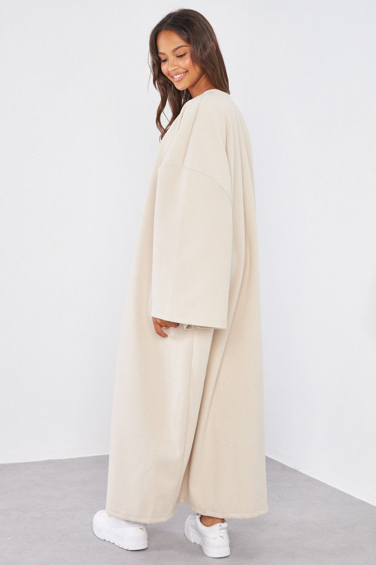 Manteau beige à manches amples