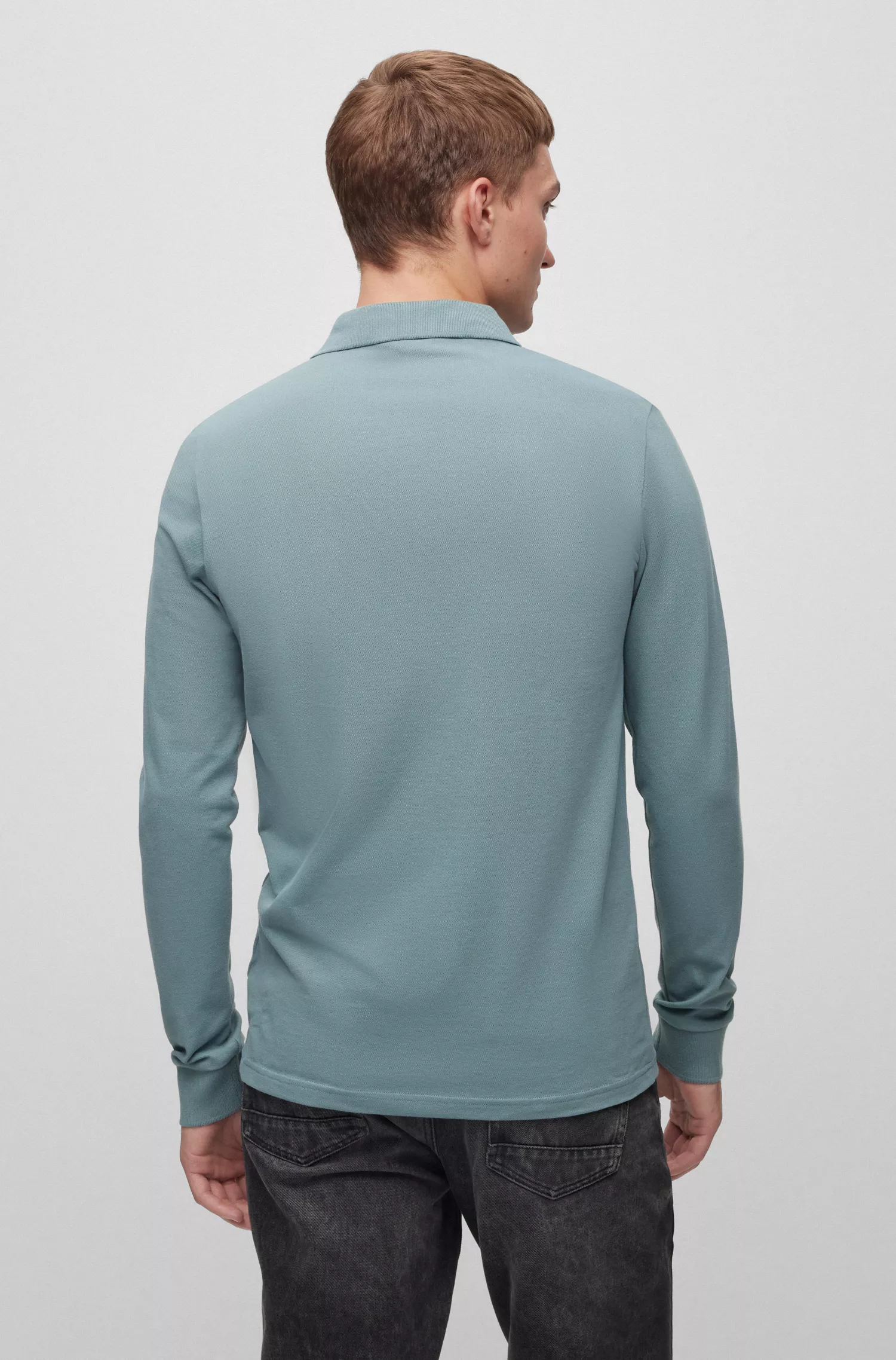 Camisa polo BOSS laranja de manga comprida e corte slim com etiqueta de logotipo.