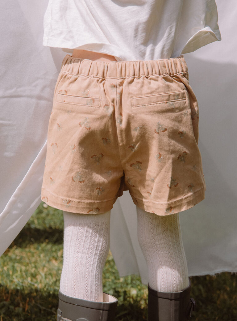 Jupe-short beige à imprimé fleuri pailleté