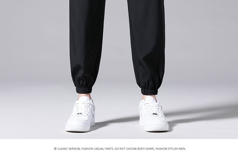 Acrius - Effen cropped harembroek met trekkoordtaille