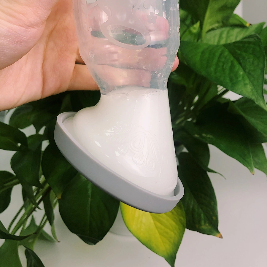 haakaa® Milchpumpe mit Saugfuß 150 ml und Silikondeckel Set, transparent
