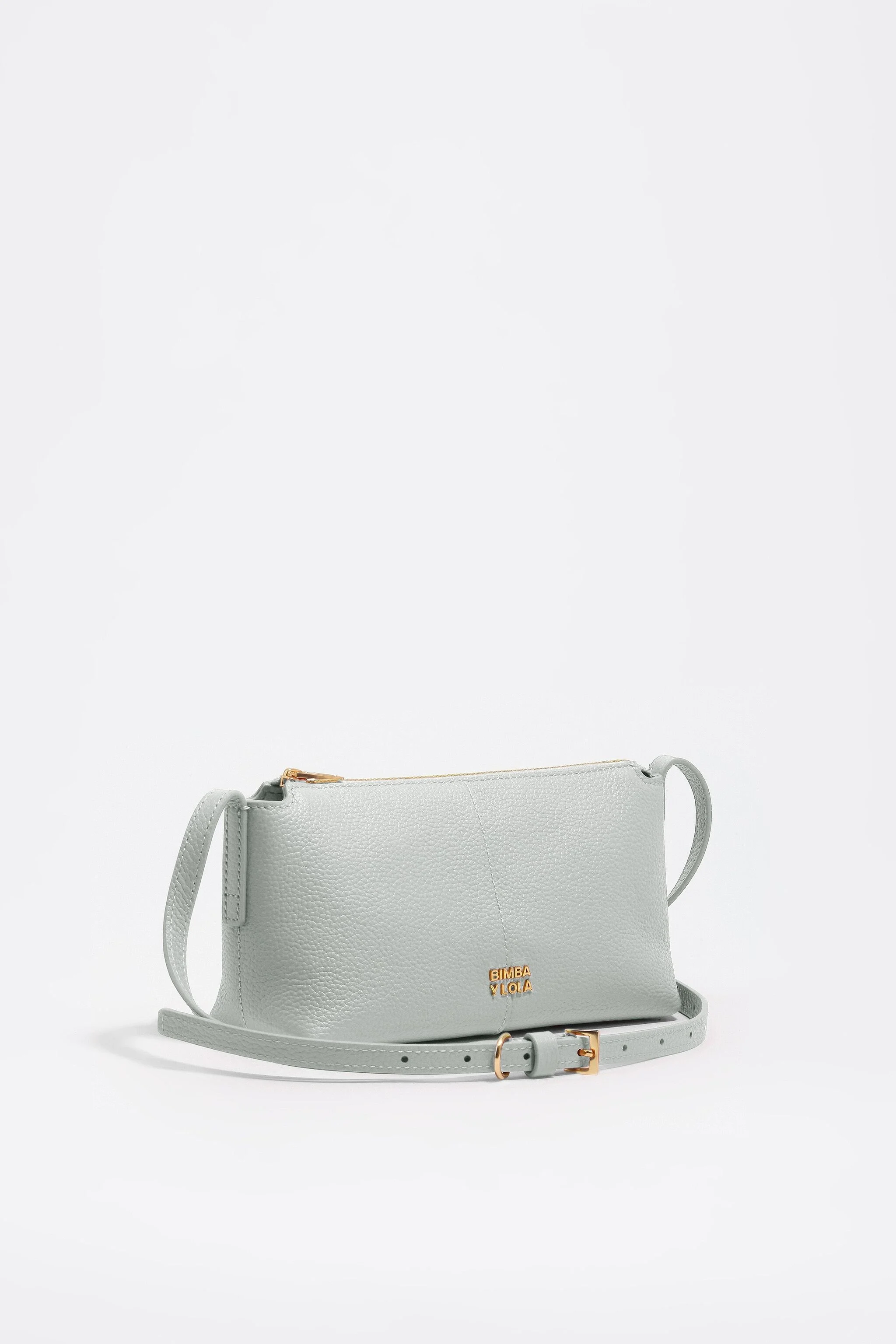 Bolsa transversal mini em couro branco pedra
