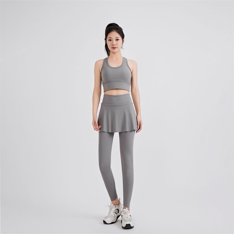 KUMI - Set: Sportieve effen bh-top + yogabroek met hoge taille en rokoverlay