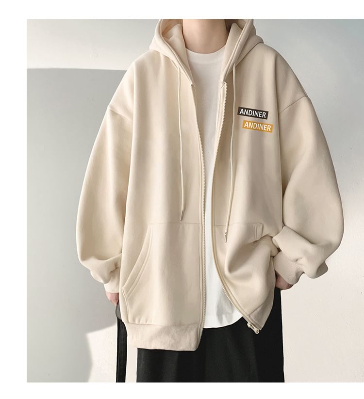 FOEV - Oversized hoodie met rits en tekstprint