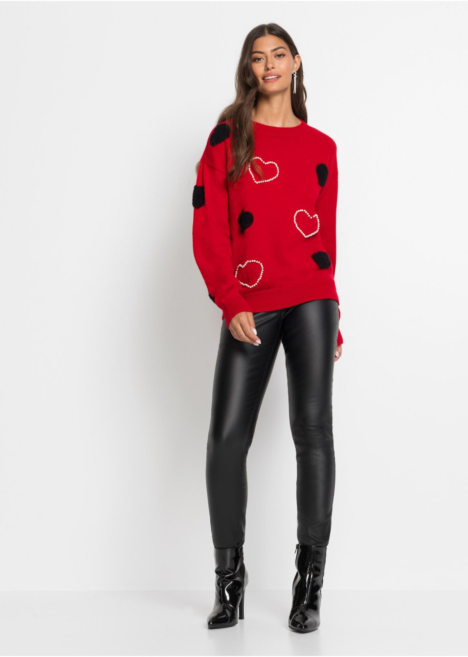 Pull avec éléments décoratifs appliqués