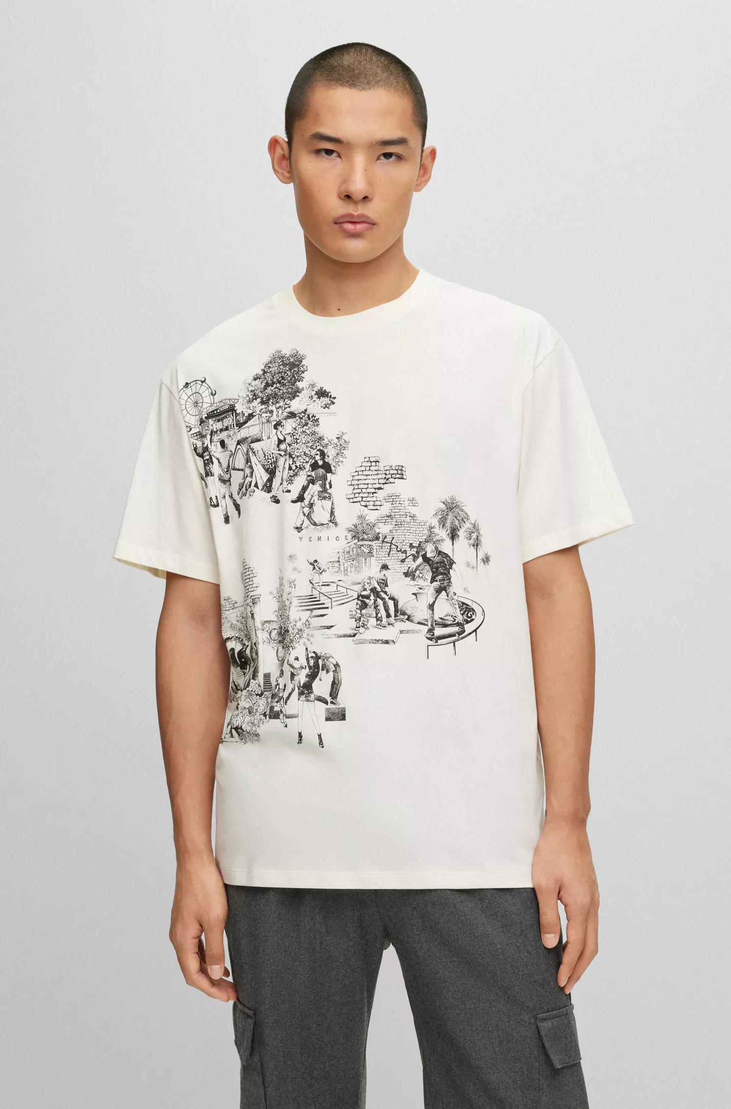 Camiseta HUGO vermelha em malha de algodão com modelagem relaxada e estampa sazonal.