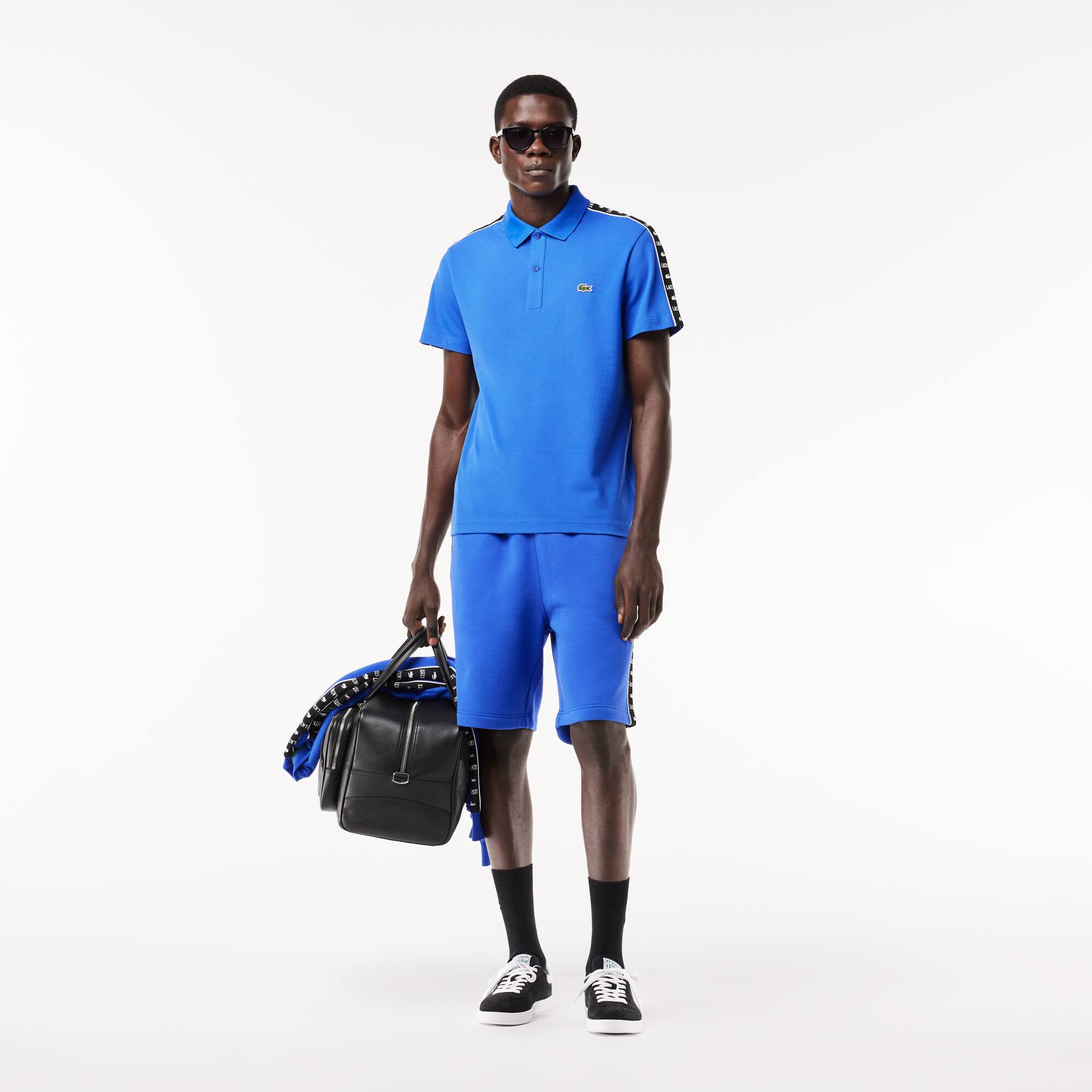 Polo en mini piqué stretch à bande siglée Manches Courtes - Bleu - Lacoste - Homme