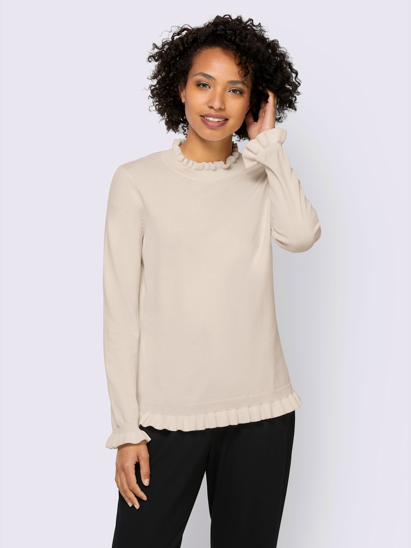 Pull col montant, manches et ourlet à finitions ondulées
