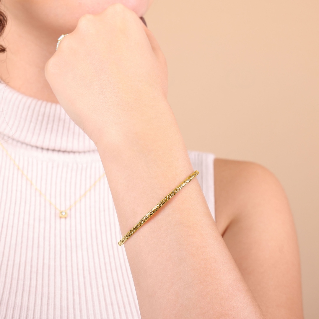 Armreif rund 750/18 K Gelbgold verziert 3.2mm
