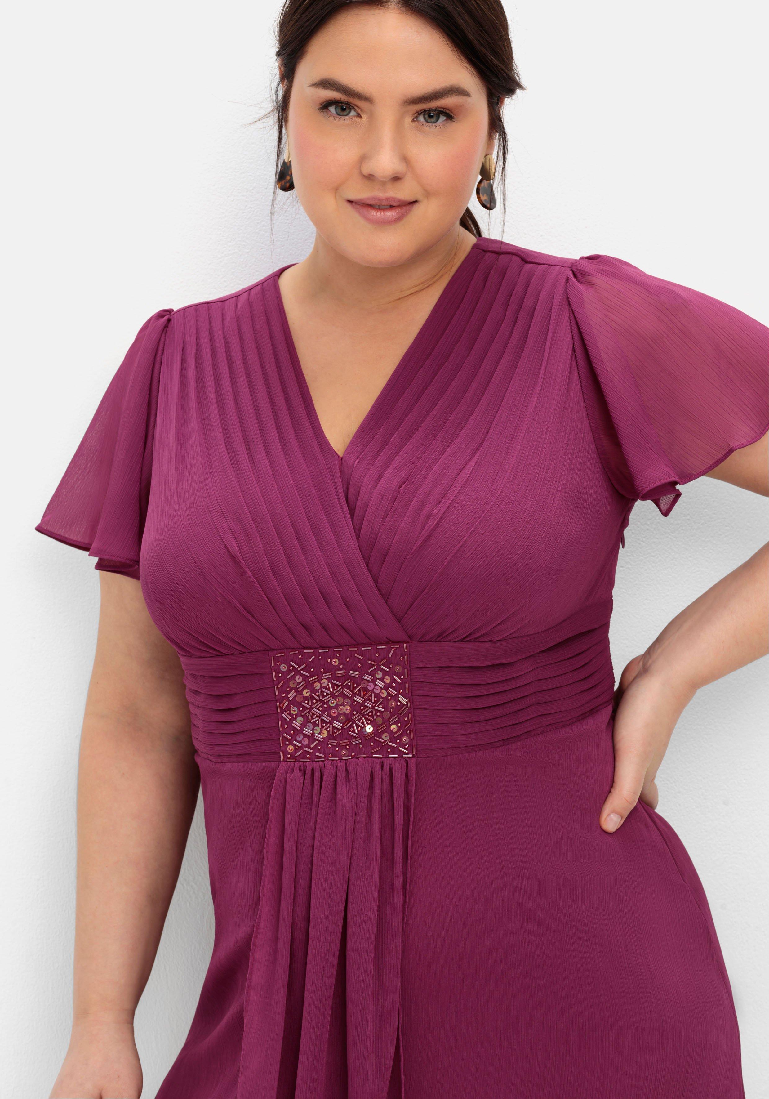 Abendkleid mit Schmuckbrosche, in A-Linie