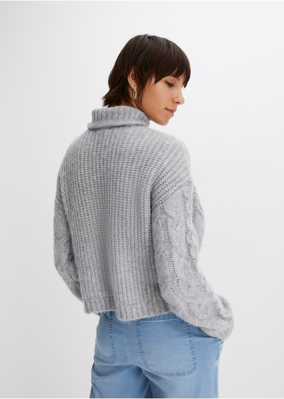 Pull en maille à torsades