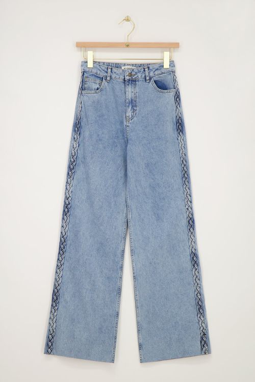 Blauwe jeans met vlecht detail
