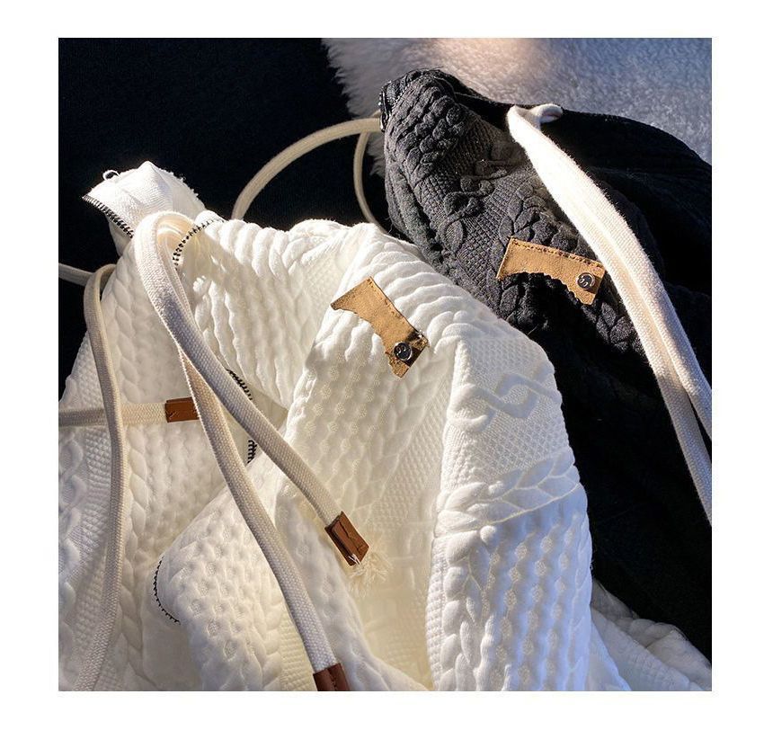 Cossita - Oversized hoodie met rits en applicatie