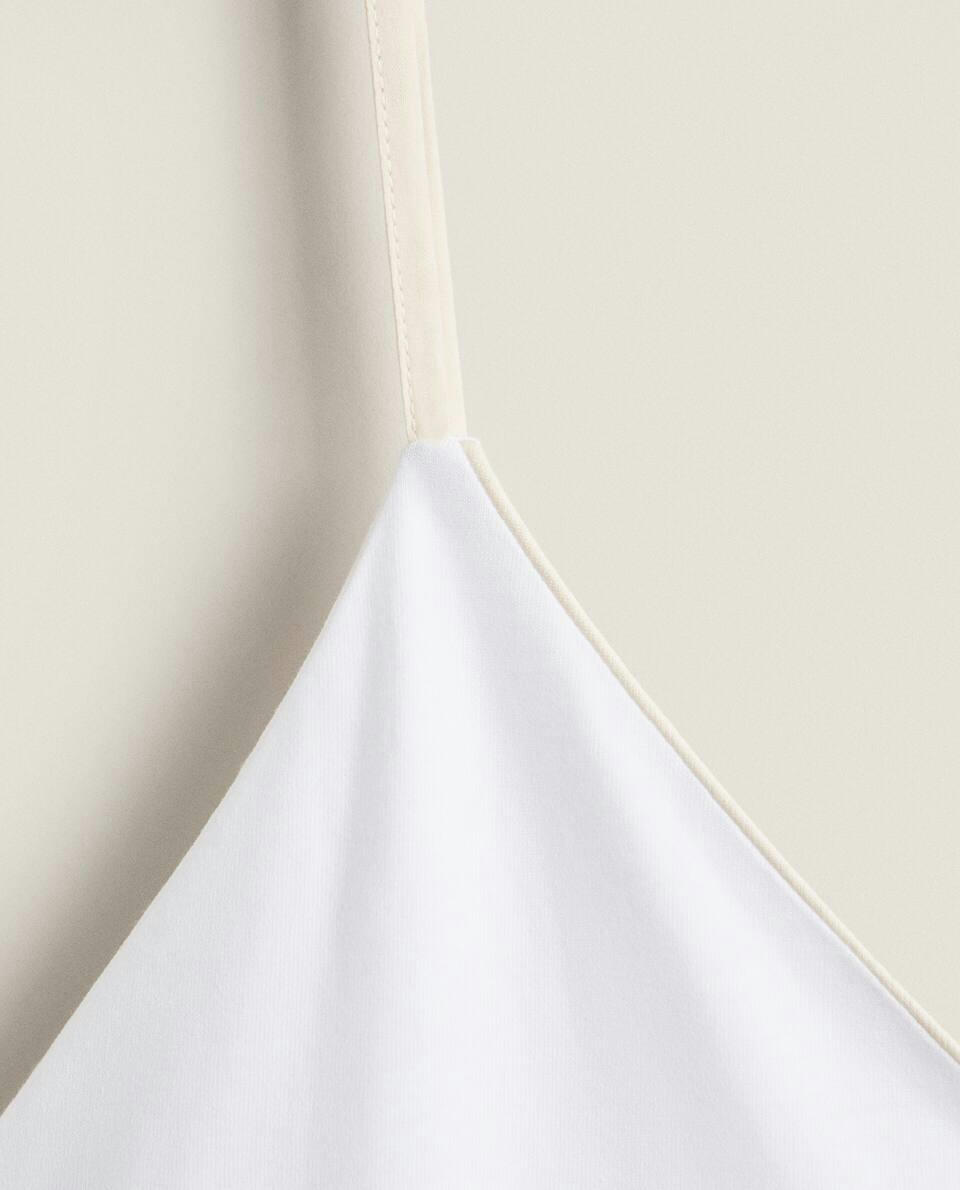 Blusa de algodão com acabamento em viés