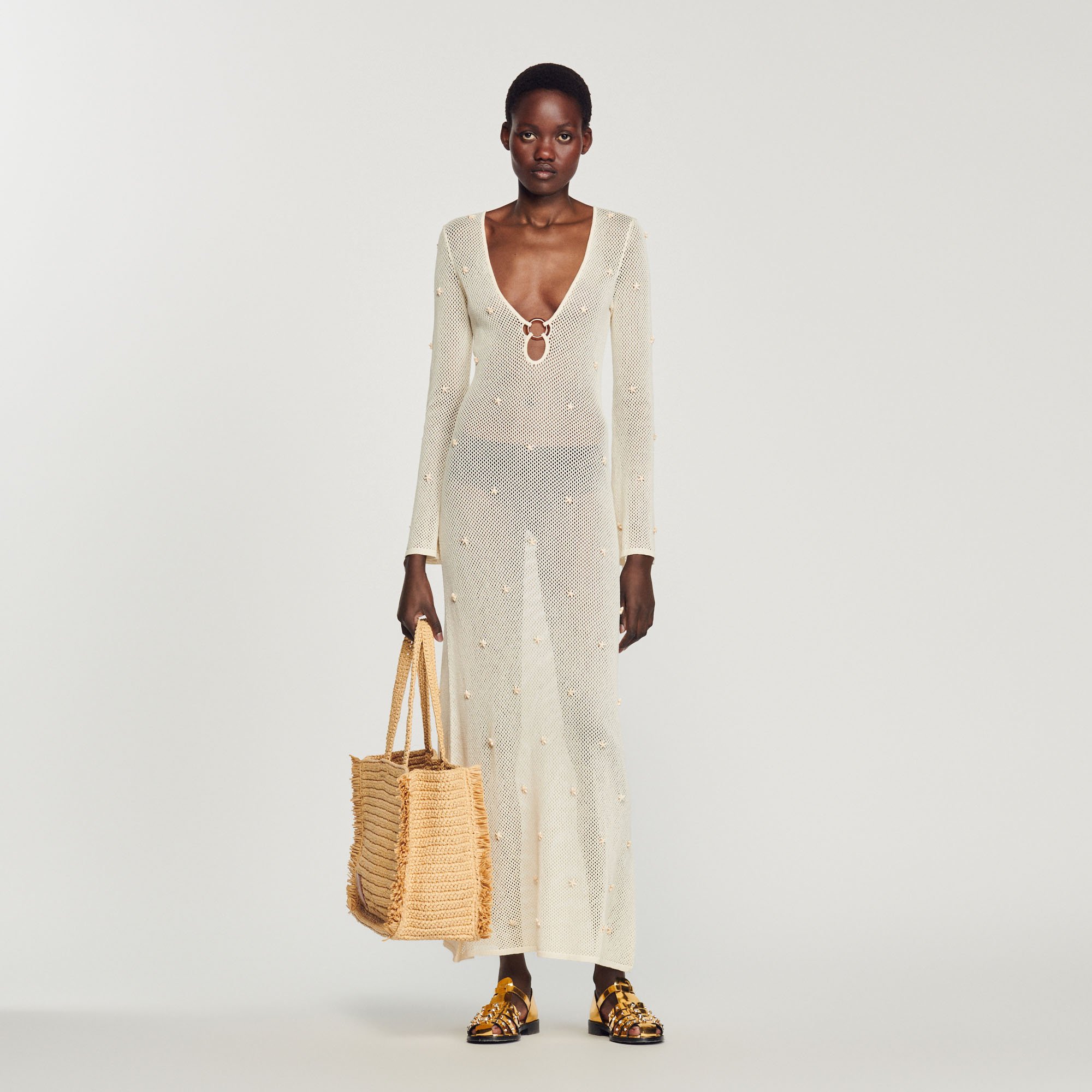 Robe longue en resille á pampille