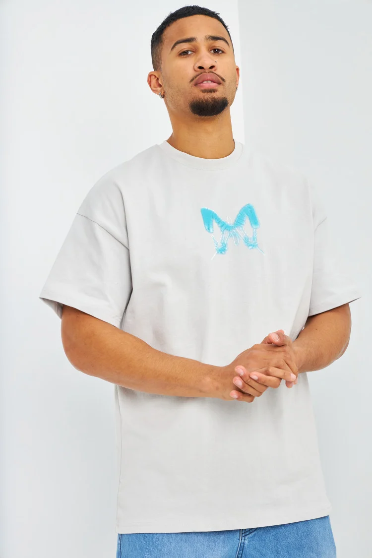 T-shirt gris clair oversize papillons bleus
