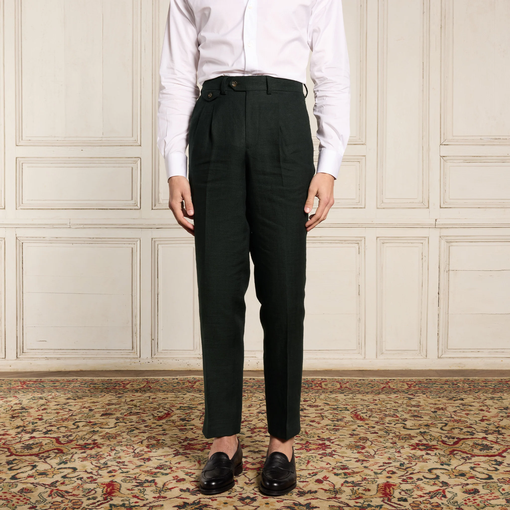 Double-pleated green linen pants