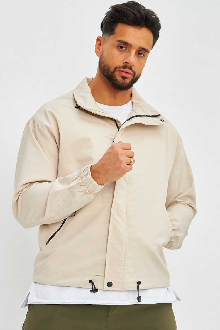 Veste beige col montant