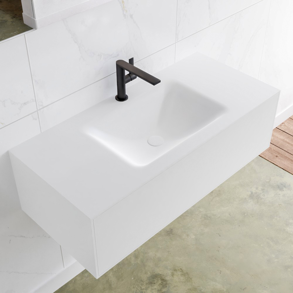 SCHADEMODEL: Zaro Lagom volledig naadloos solid surface onderkast 100cm mat wit met 1 lade Push tot open. Compleet met solid surface wastafel met 1 kraangat(en)