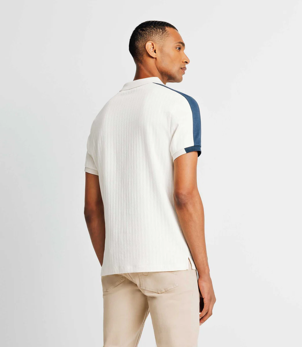 Polo gravé en coton écru