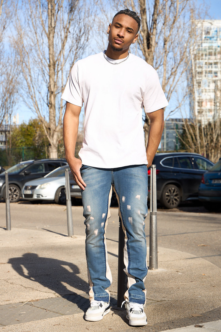 Jean bleu taché