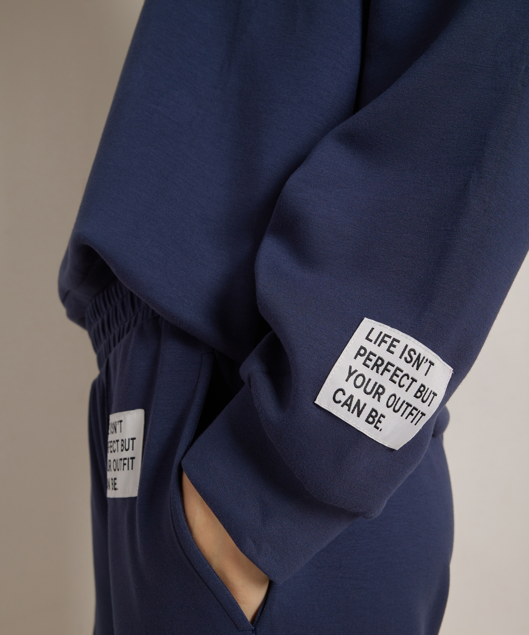 trui met mouwlabel