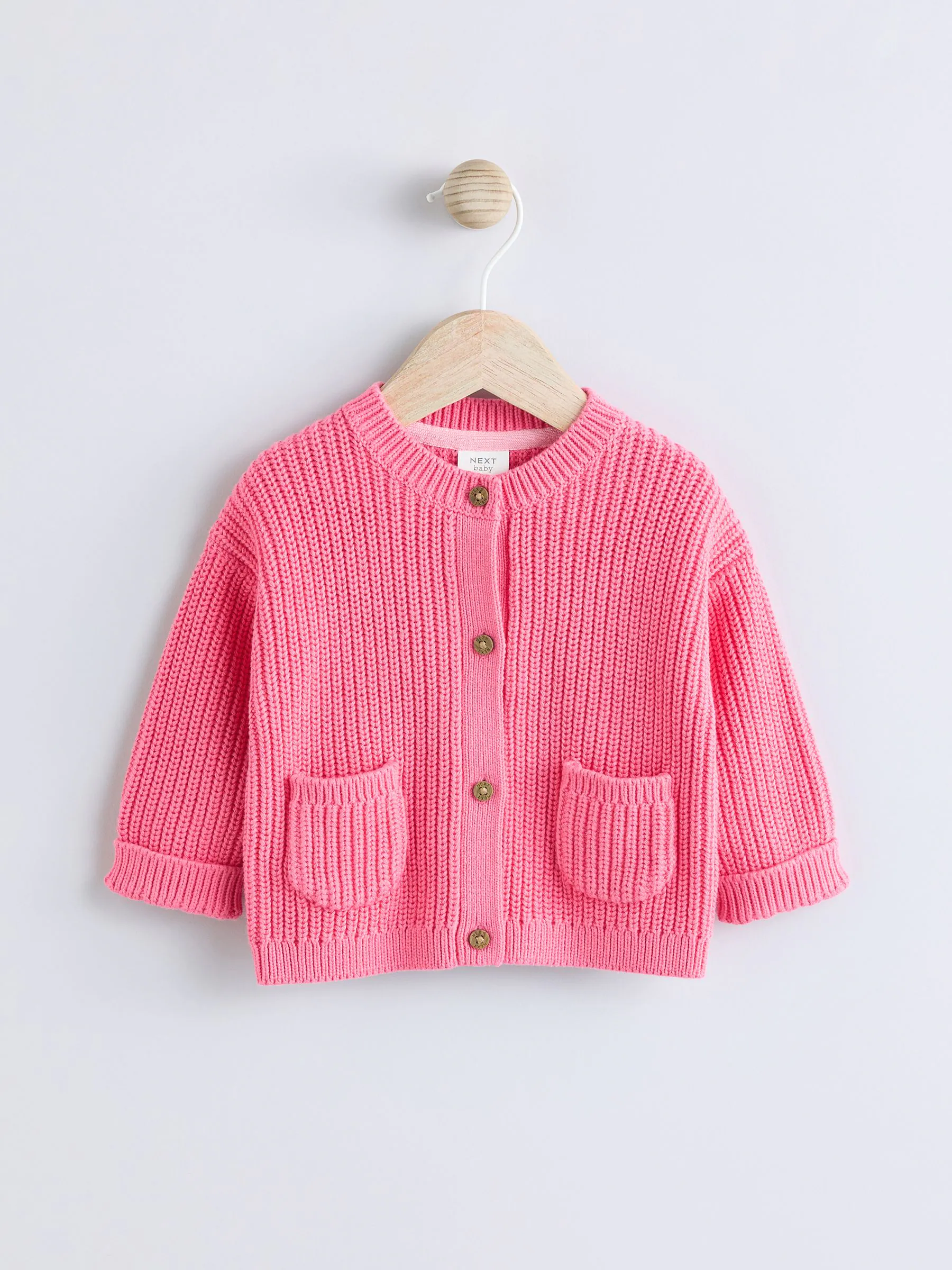 Roze met smiley - Geborduurd vest (0 mnd - 2 jr)