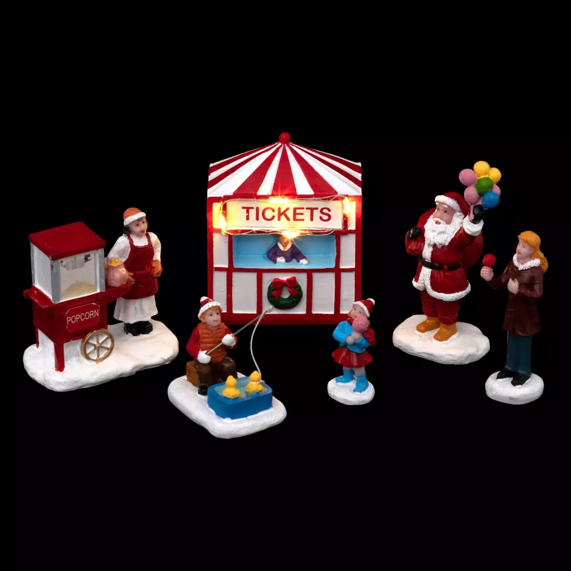 Lot de figurines et accessoires Fête foraine du Père Noël pour village