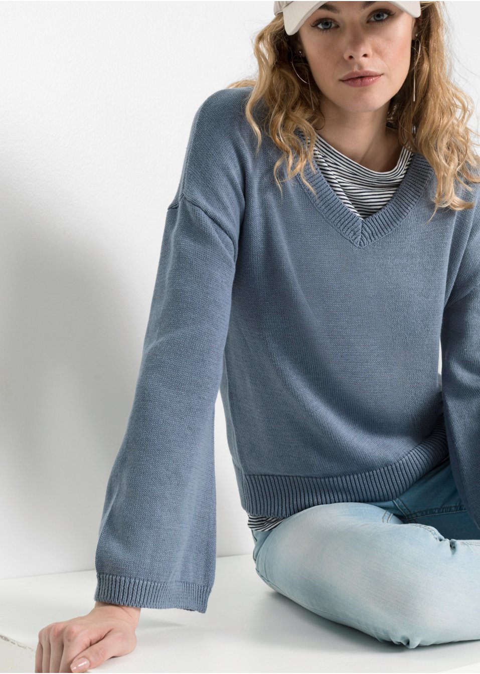 Pull à détail nœud et manches amples
