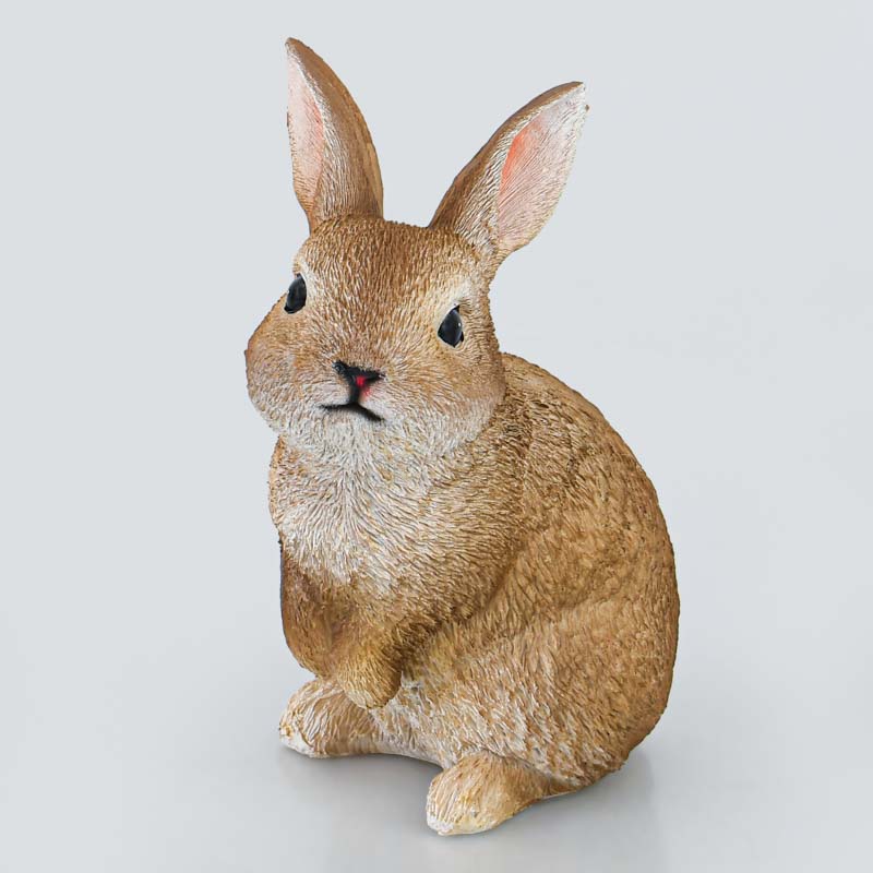 Lapin assis décoratif