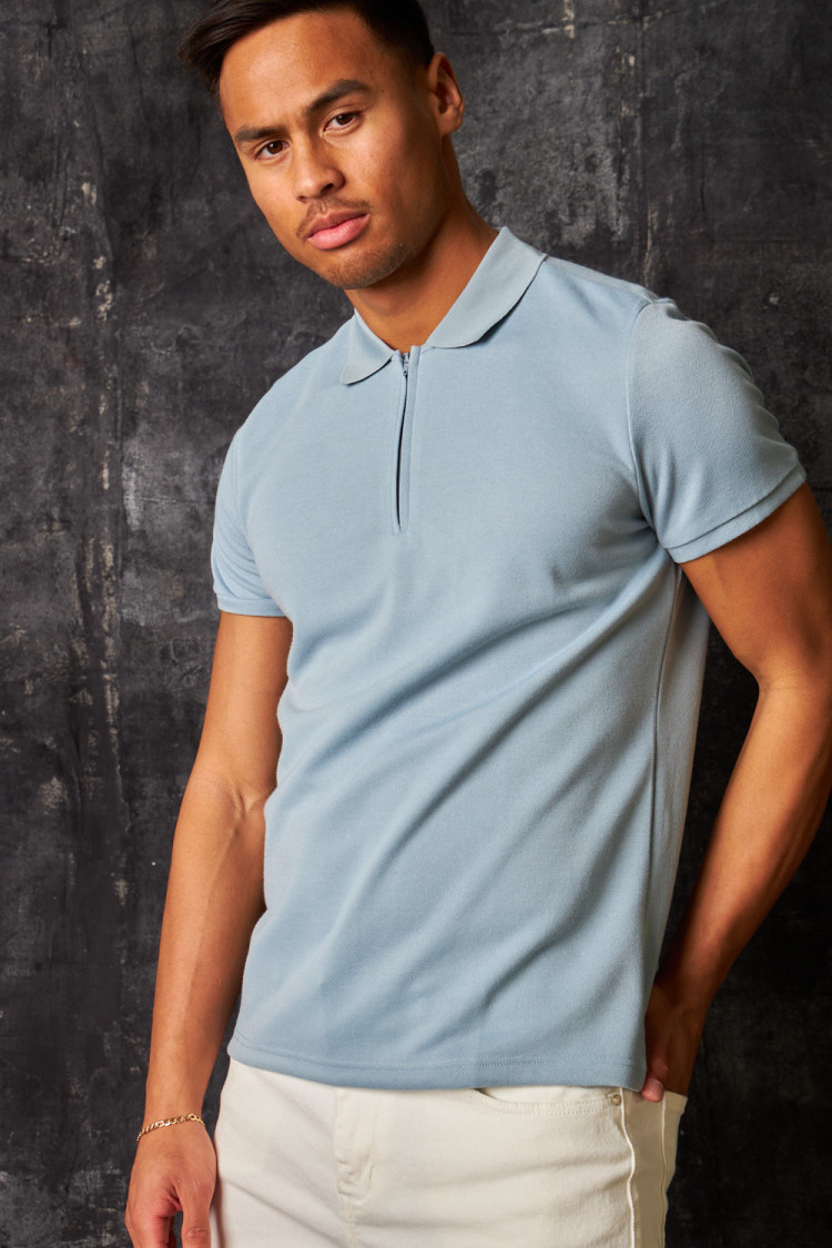 Polo manches courtes à col zippé bleu clair