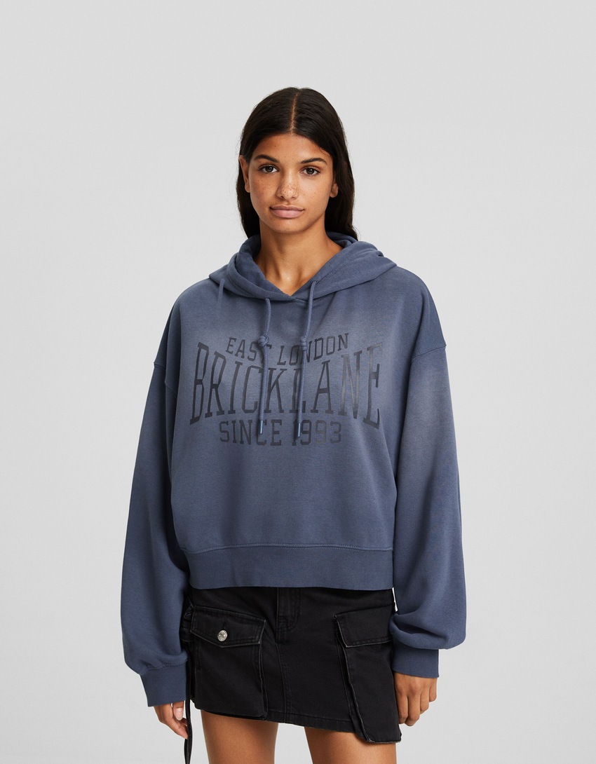 Moletom oversized com efeito desbotado e slogan