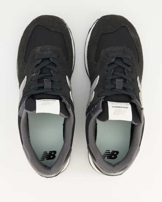New Balance 574 Sneaker in Schwarz