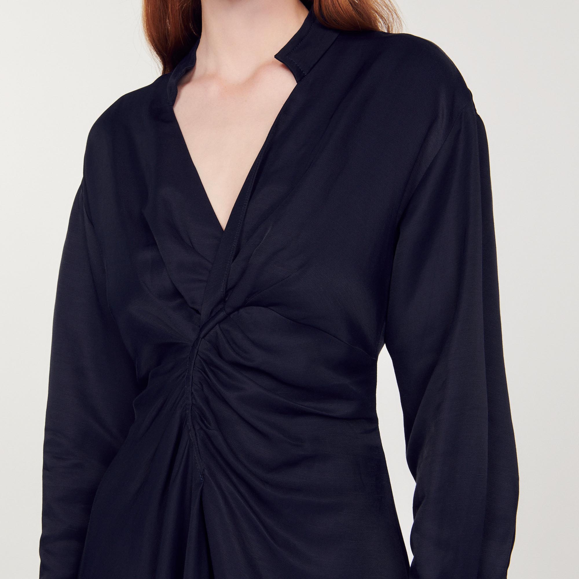 Robe courte á manches longues