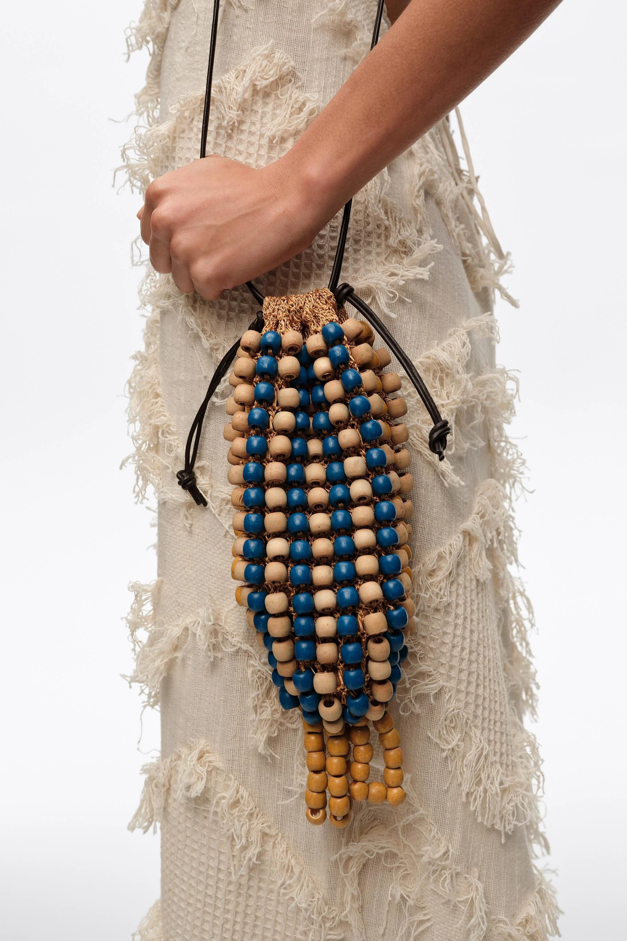 Bolsa mini azul de crochê