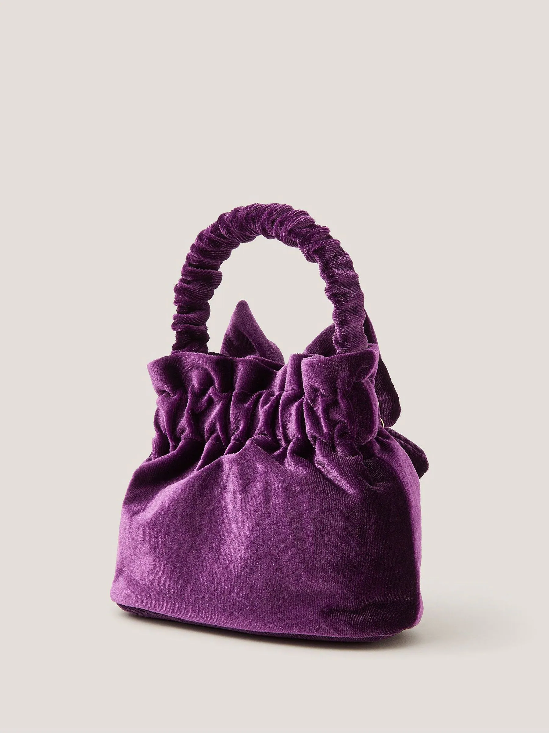 Monsoon Bow Velvet Pouch Bag