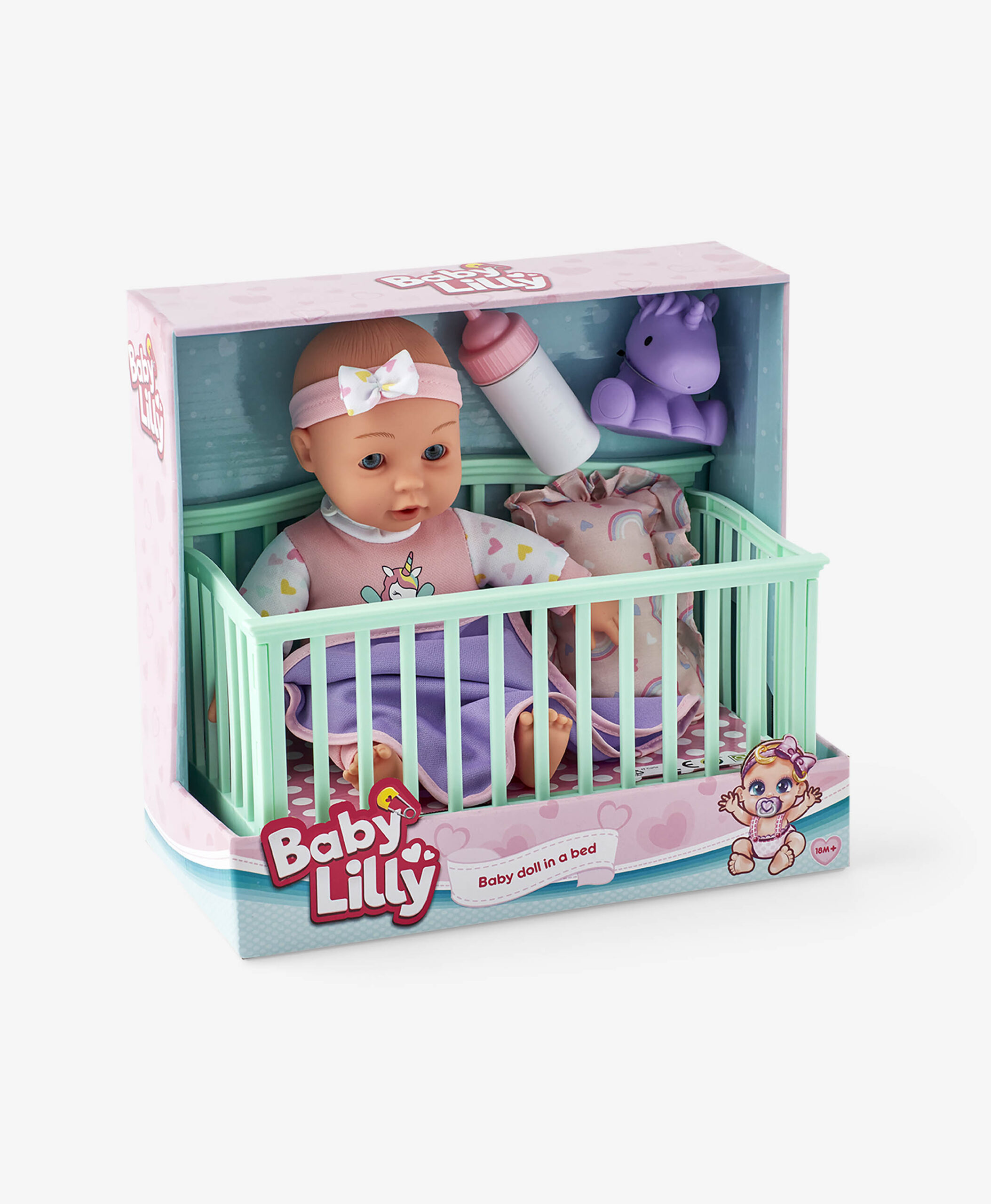 Babypuppe in Kinderbett