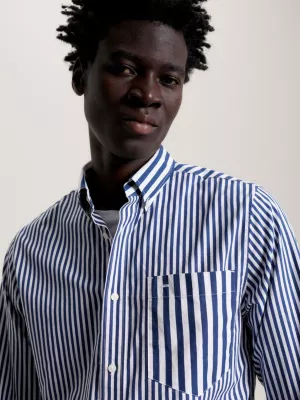 Camisa clássica com listras marcantes e modelagem regular.