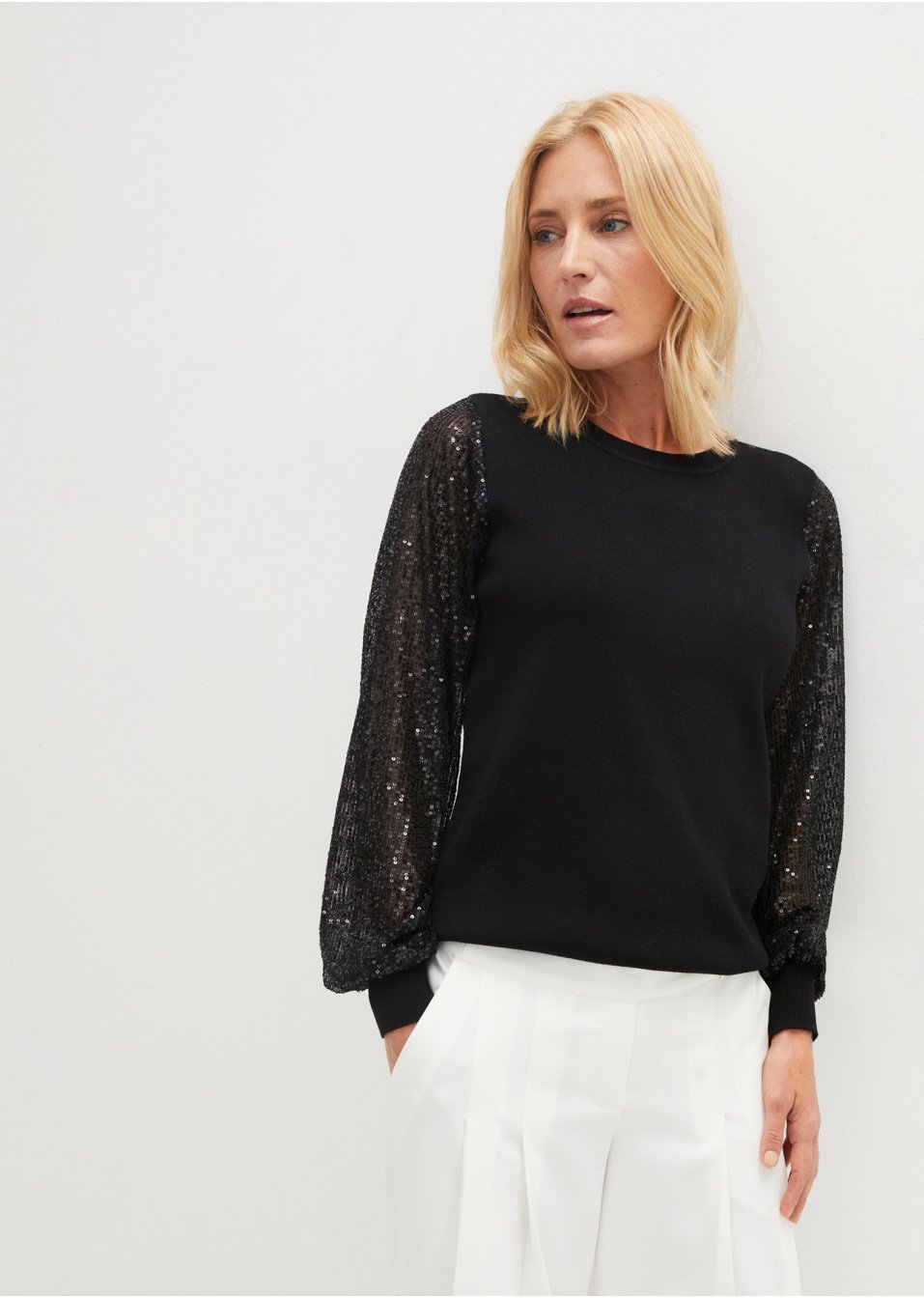 Pull avec manches pailletées