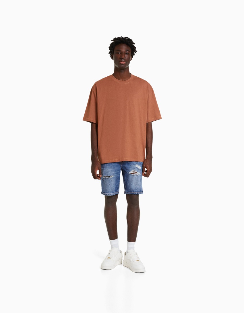 Bermuda jeans rasgada
