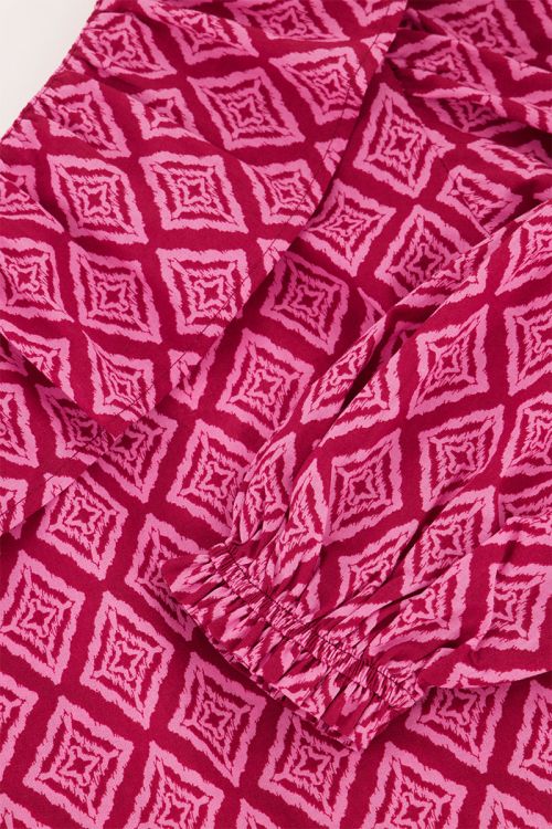 Roze one-shoulder top met ikat print en ruffle