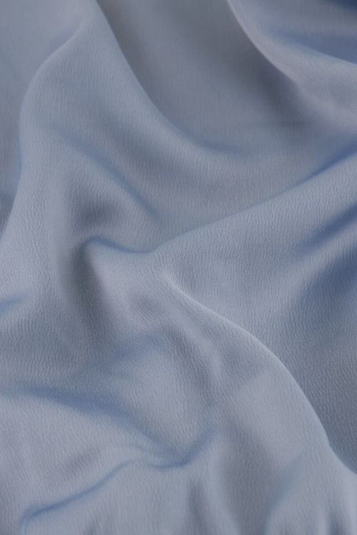 Blauwe satijnen top met knoop