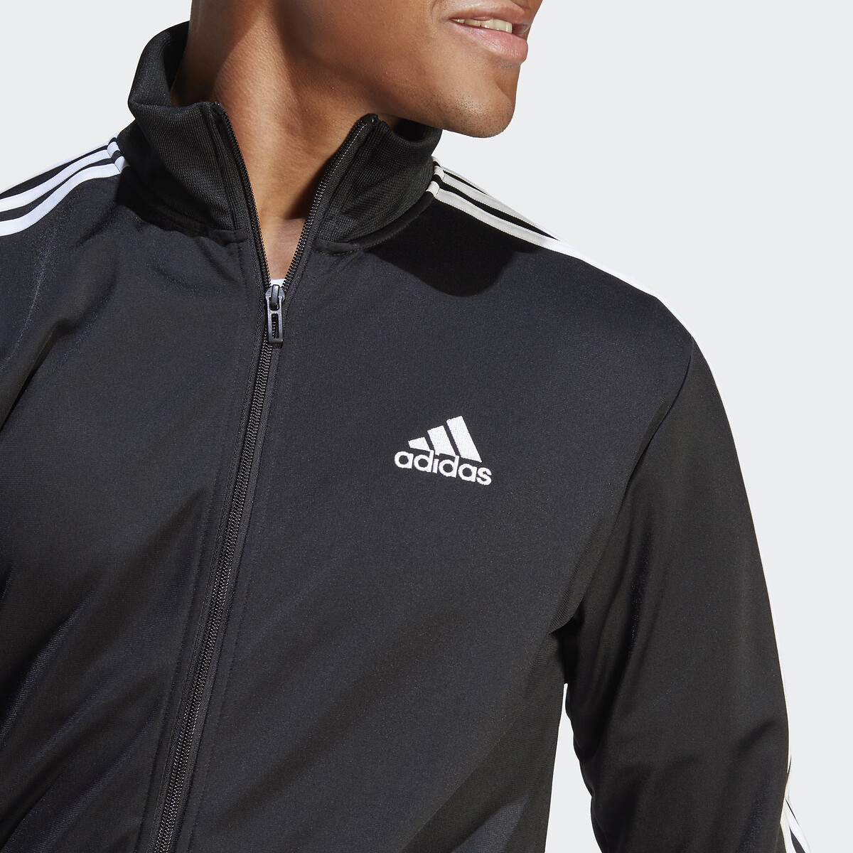 Roupa esportiva Adidas<br>Conjunto esportivo de tricô com 3 listras