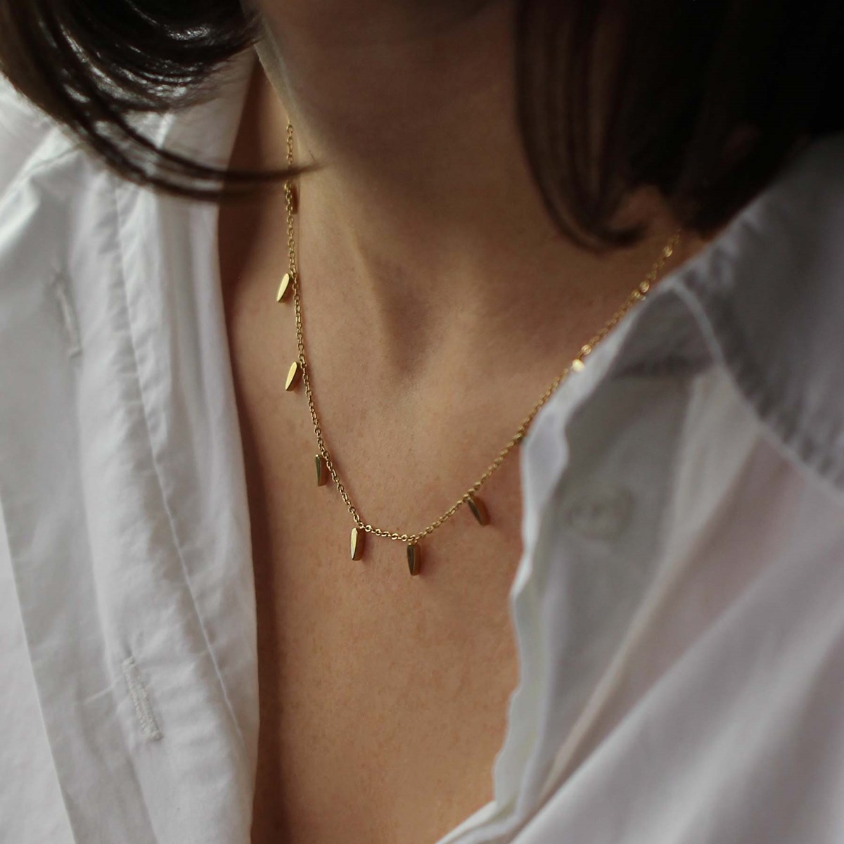 Collier Plume acier doré or