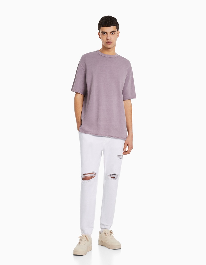 calça jogger rasgada